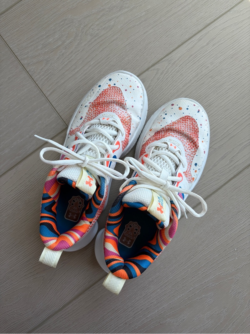 Under Armour White Sneakers with Orange Accents and Colorful Lining